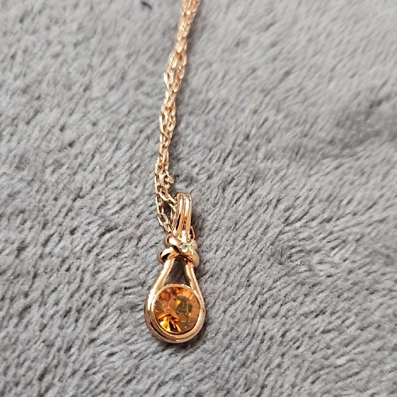 Radiant Gold Necklace with Orange Gemstone - Picture 1 of 3